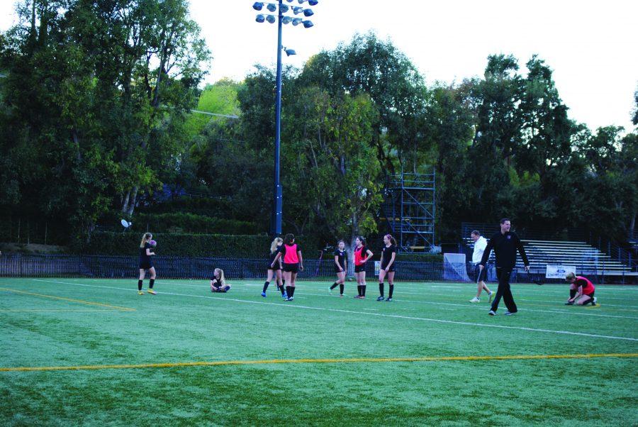 Girls' soccer team practice after school at the Upper School. Credit: Casey Kim'20/SPECTRUM