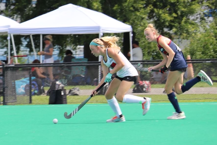 Margaux Schlumberger 27 gets a breakaway dribble as she dodges a defender.