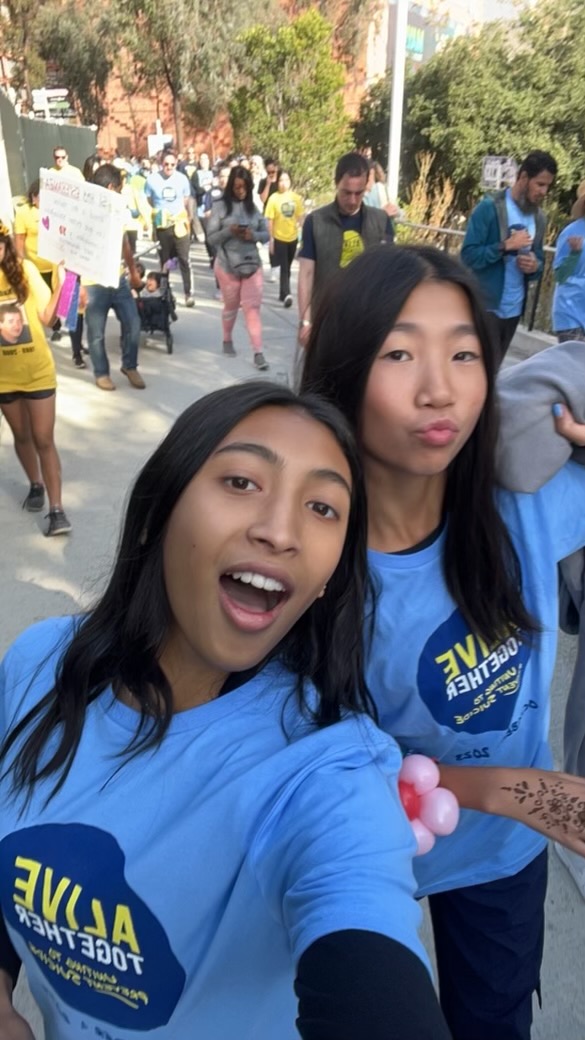 MHAC leaders Malena Atluri 27 and Amanda Shu 27 participate in the 2023 Alive Together: Uniting to Prevent Suicide Walk.