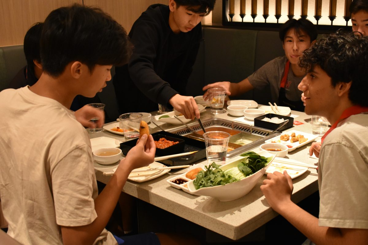 Students from Chinese II and III eat hot pot.