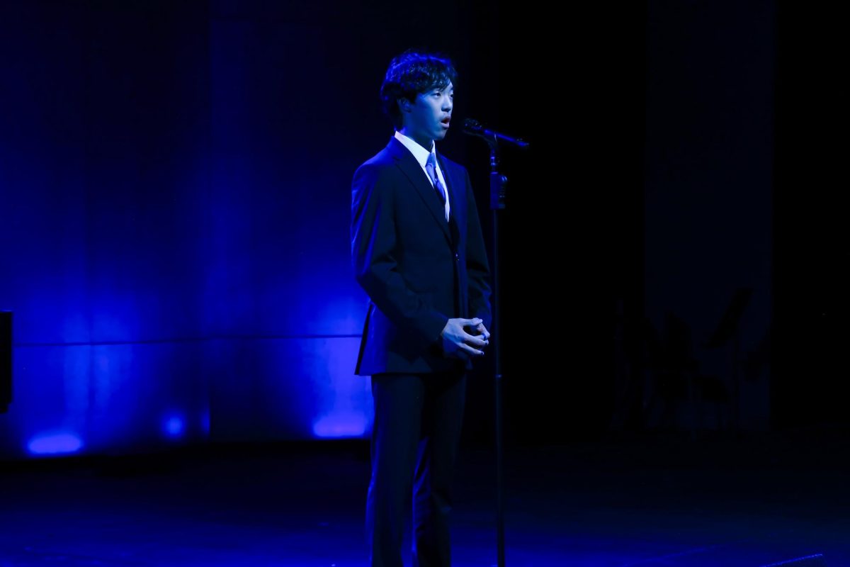 Eric Kim '28 sings in the Vocal Solo Show