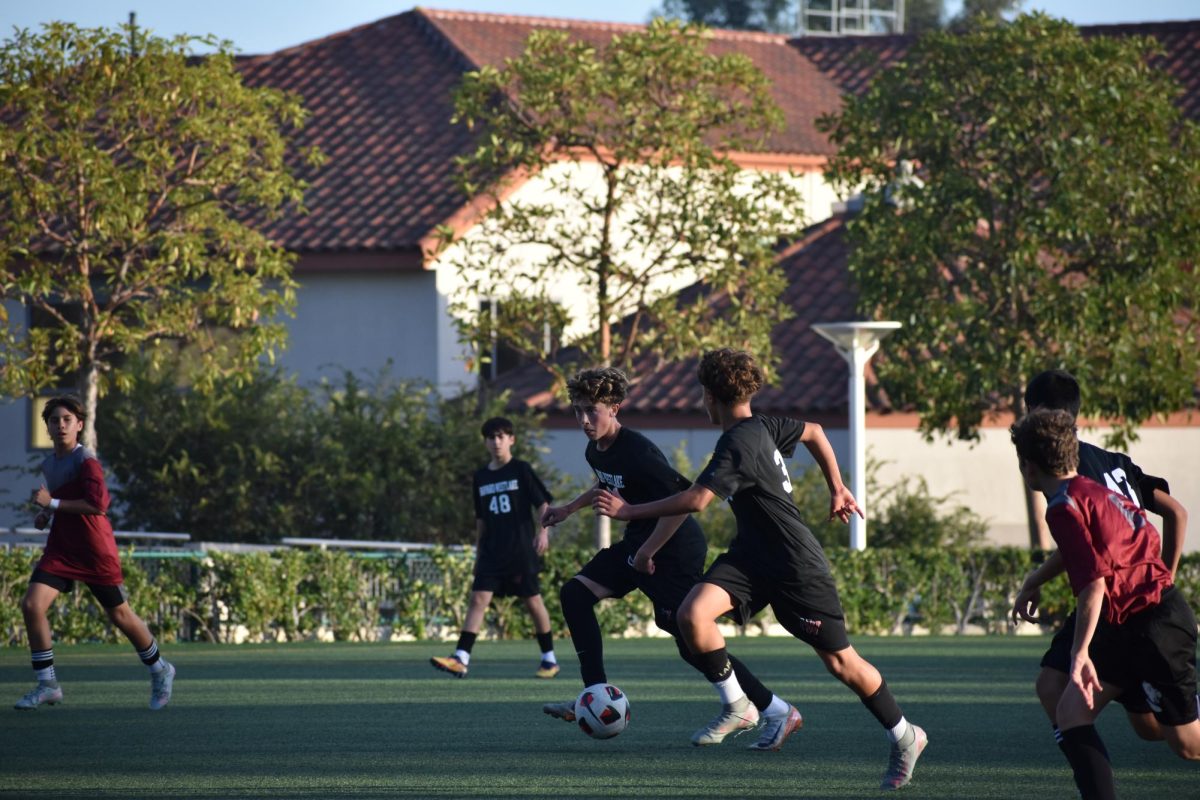 Brooks Resnikoff '30 dribbles through defenders to score