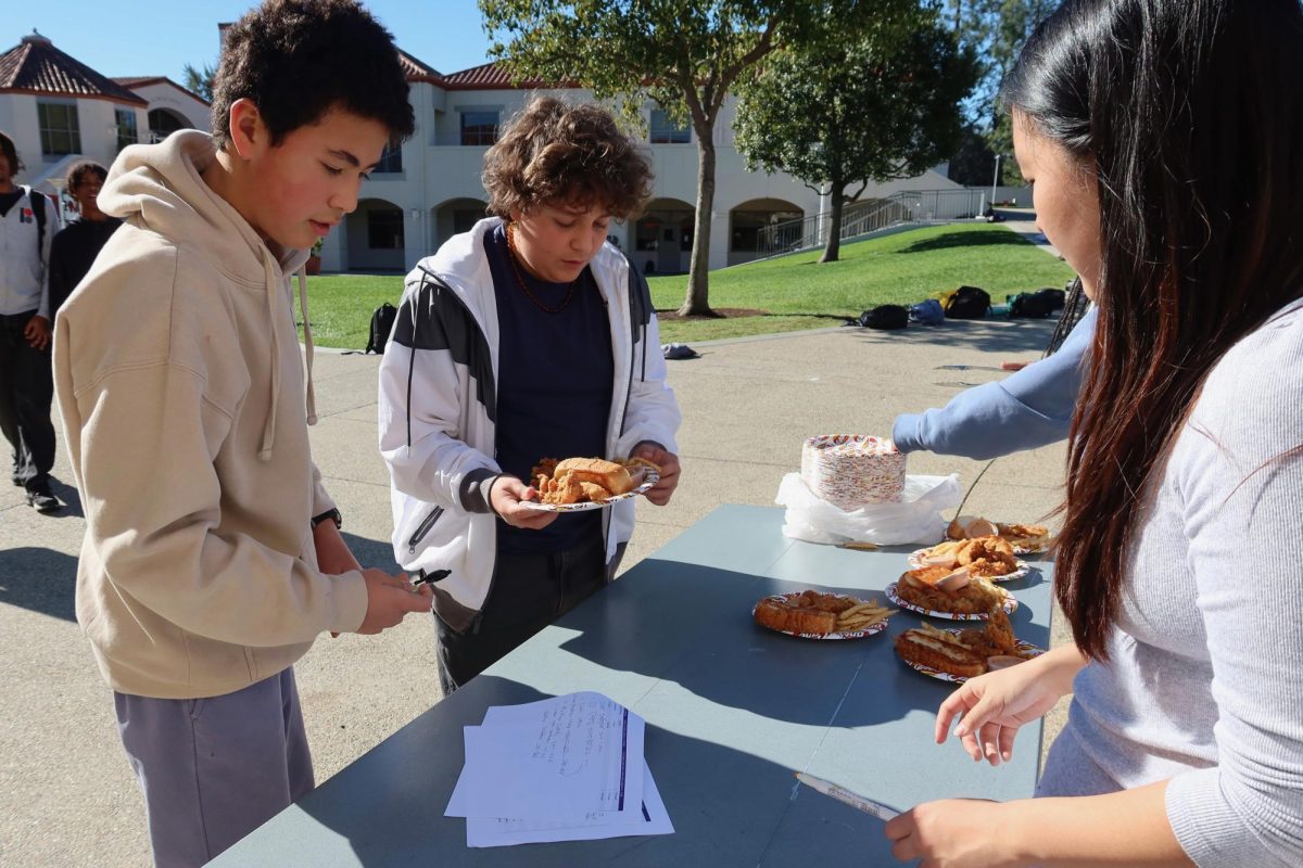 Students received their orders during lunchtime.