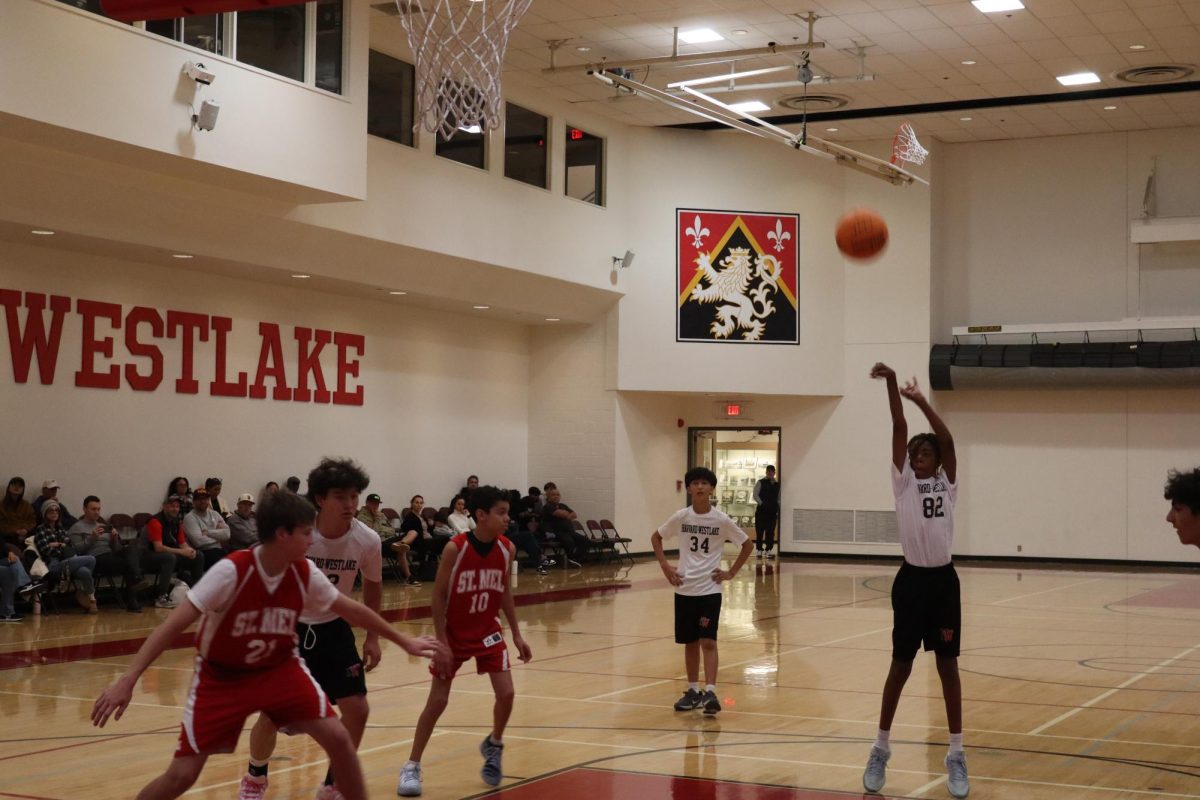 Miles Benoit ’30 takes a free throw shot.