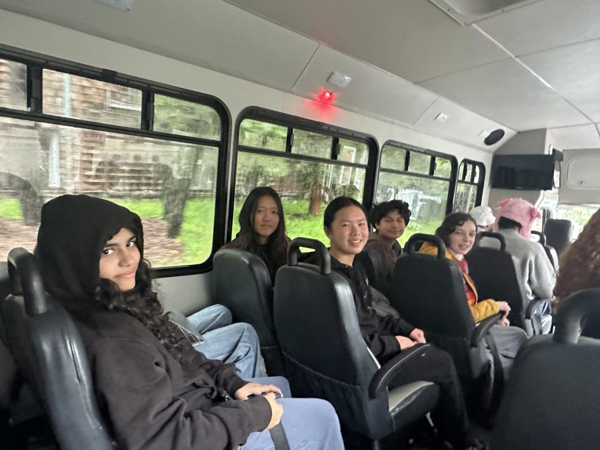Debaters pose for a photo as they anticipate their upcoming tournament 