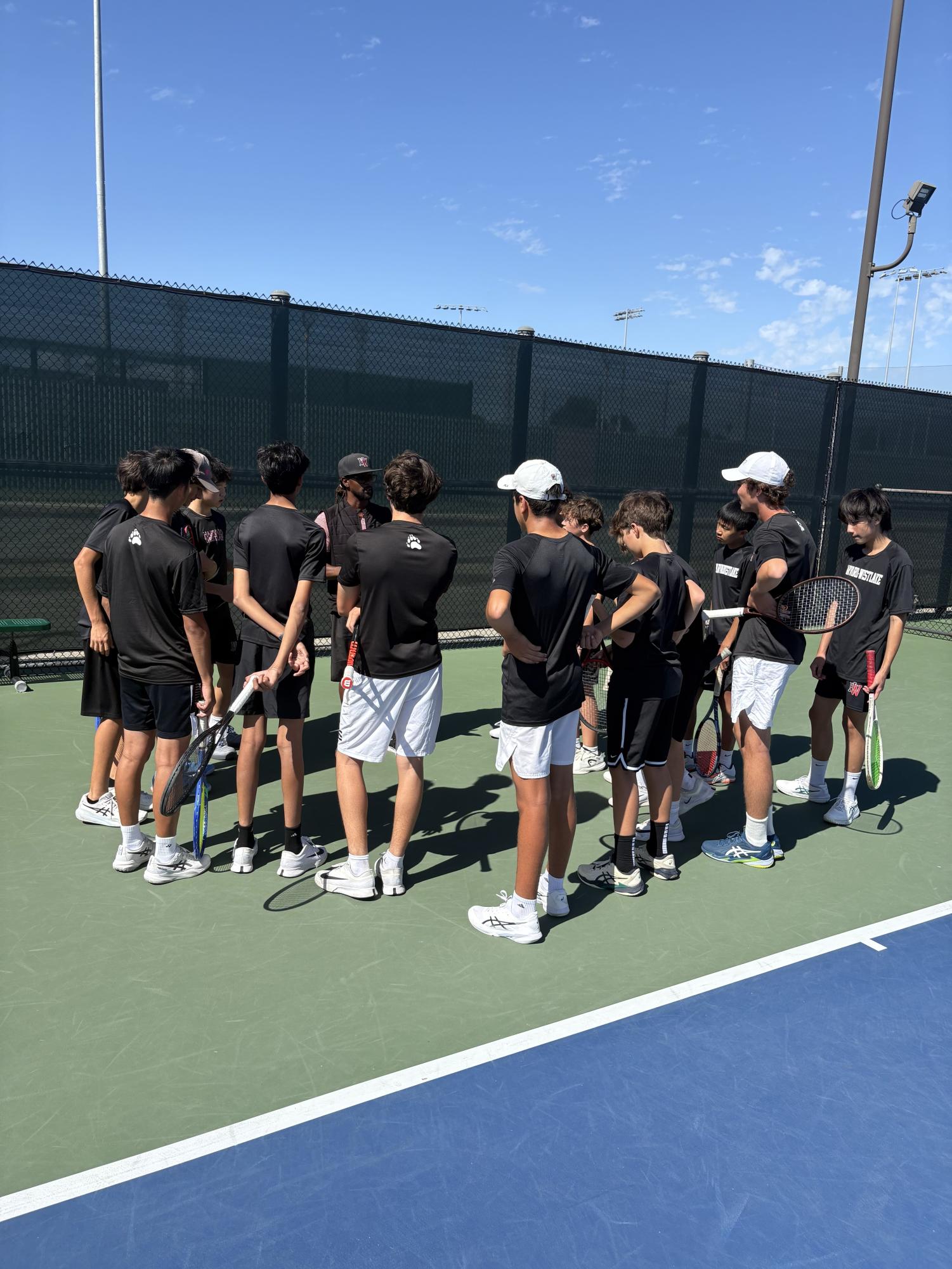 BOYS BLACK TENNIS TEAM PREVAILS OVER OAKWOOD TO FINISH OFF UNDEFEATED REGULAR SEASON