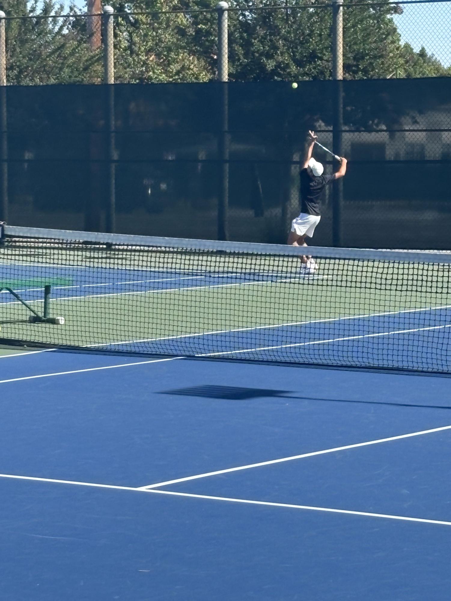 BOYS BLACK TENNIS TEAM PREVAILS OVER OAKWOOD TO FINISH OFF UNDEFEATED REGULAR SEASON