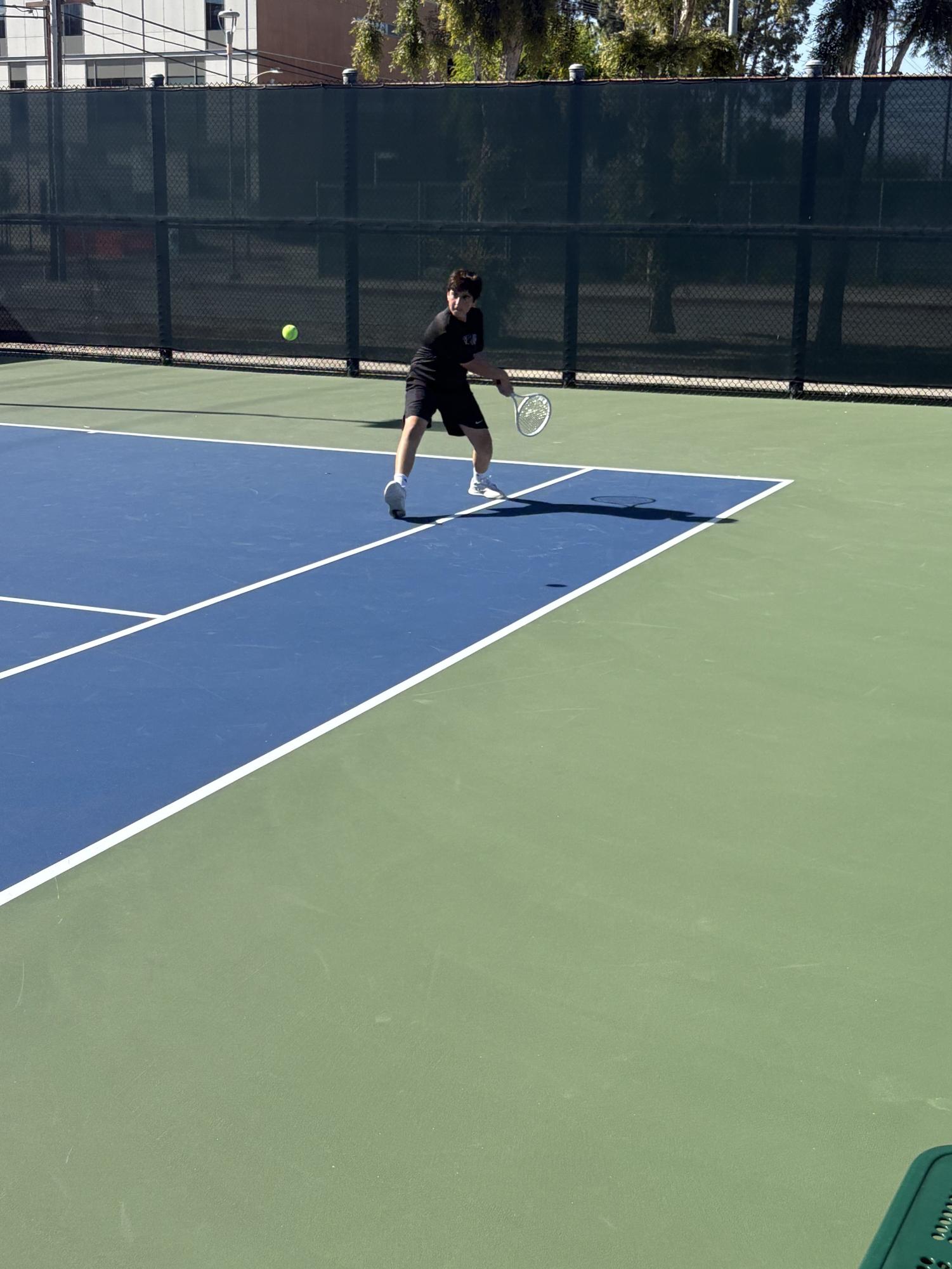 BOYS BLACK TENNIS TEAM PREVAILS OVER OAKWOOD TO FINISH OFF UNDEFEATED REGULAR SEASON