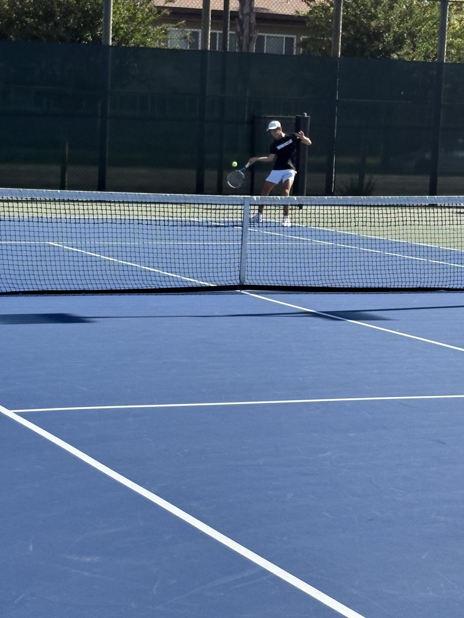 BOYS BLACK TENNIS TEAM PREVAILS OVER OAKWOOD TO FINISH OFF UNDEFEATED REGULAR SEASON