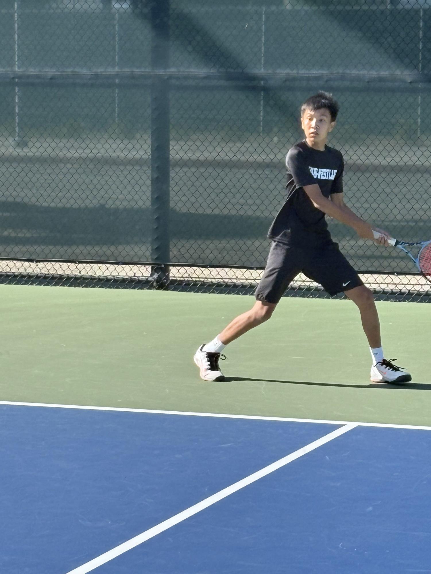 BOYS BLACK TENNIS TEAM PREVAILS OVER OAKWOOD TO FINISH OFF UNDEFEATED REGULAR SEASON
