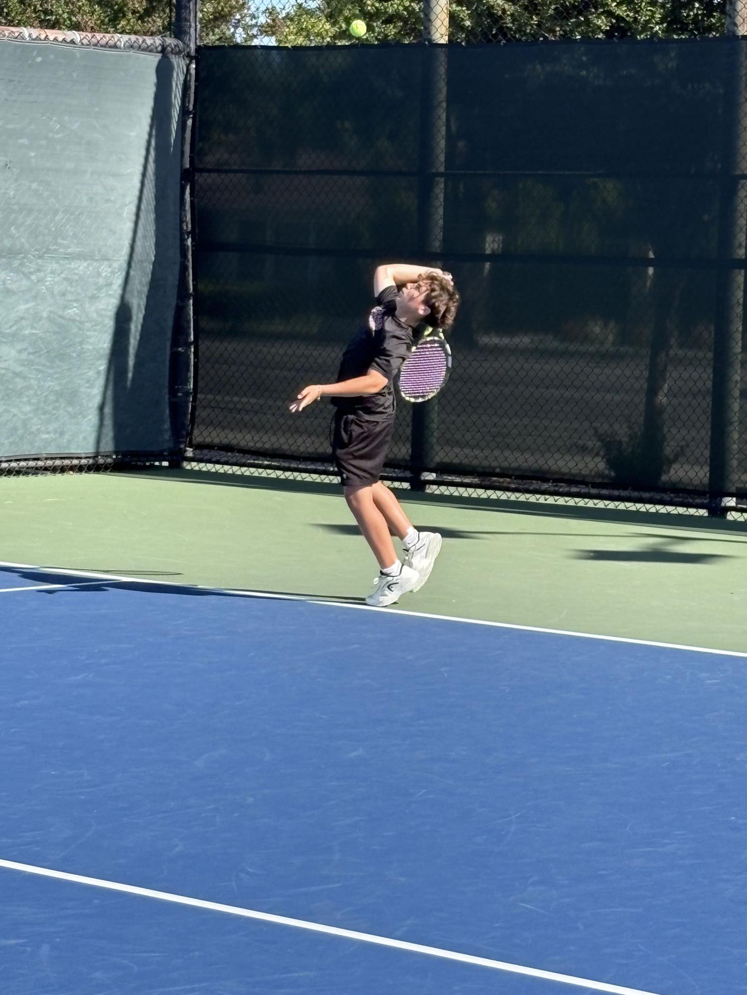 BOYS BLACK TENNIS TEAM PREVAILS OVER OAKWOOD TO FINISH OFF UNDEFEATED REGULAR SEASON