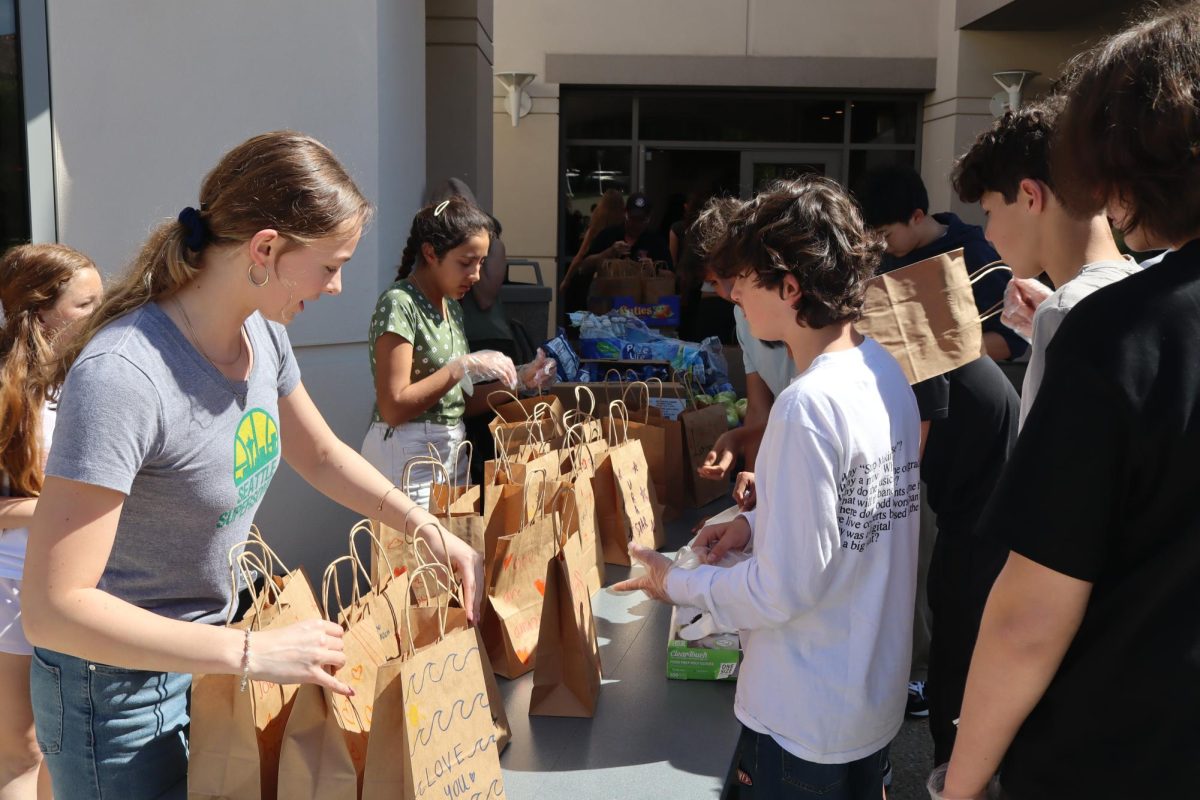 Students Pack Meals to Support Local Homeless Community